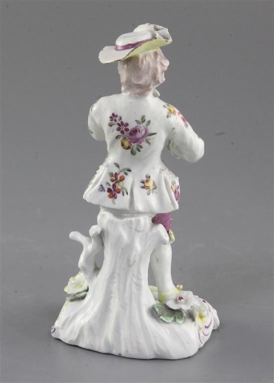 A Derby Pale Family figure of a piper, c.1758, h. 15cm, some restoration and losses